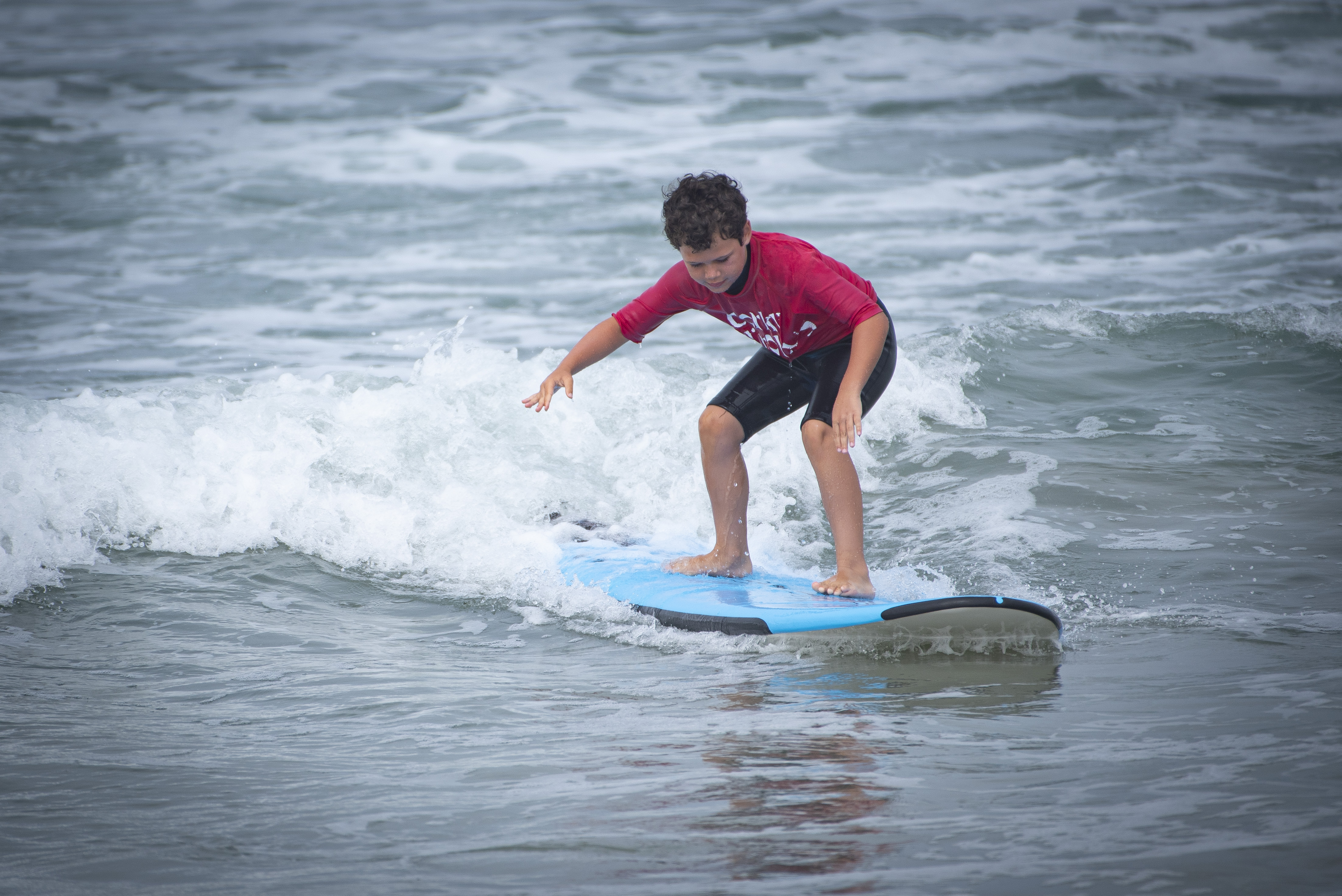 Owen first time surfing